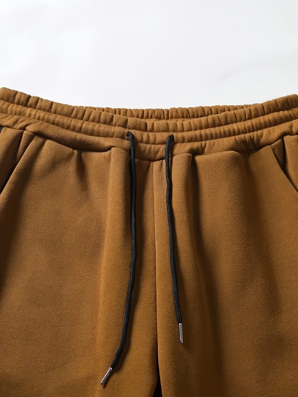 men's clothing, two piece contrasting long sleeved zipper hooded jacket and drawstring pants, suitable for outdoor wear