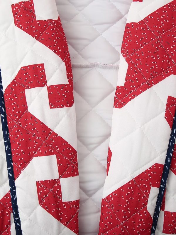 women's stylish red & white floral print quilted jacket loose fit long sleeve coat with puffy shoulders, black trim, and black beanie hat, perfect for fall fashion, autumn outerwear | puffy shoulder design | quilted texture