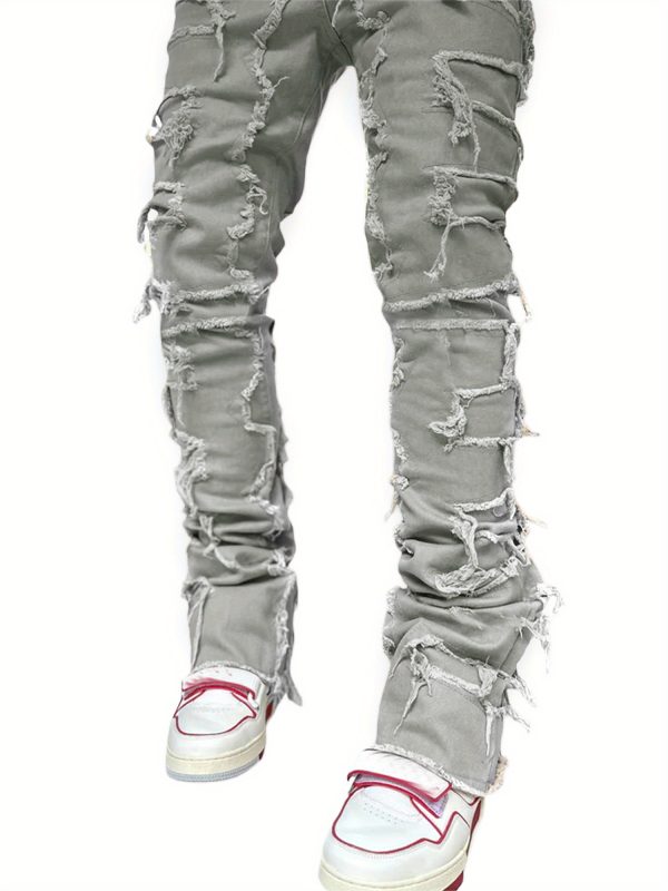 men's slim fit vintage patched distressed denim trousers for casual wear in spring and fall, featuring pockets.