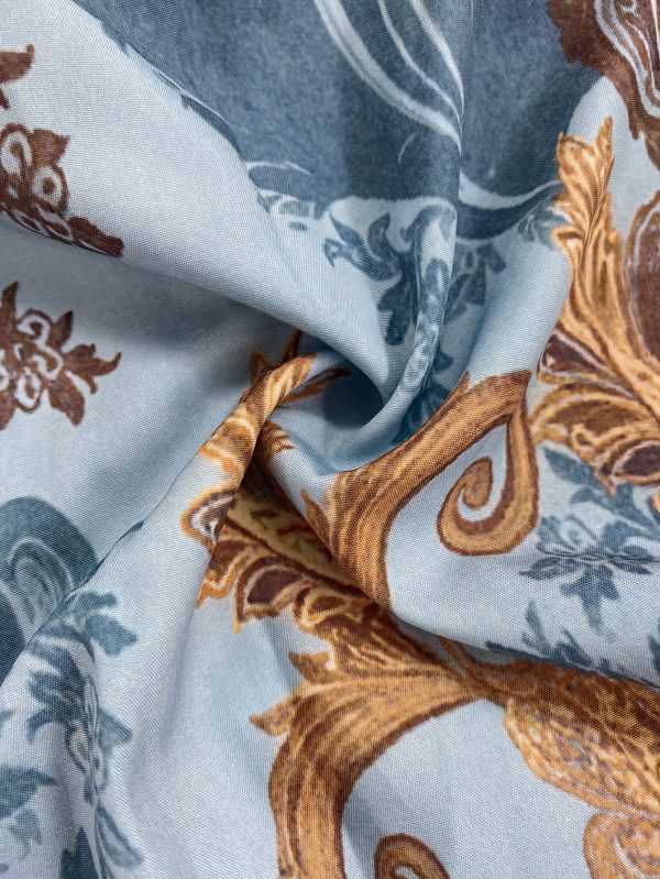 european and american men's fashion morandi color scheme with lake blue and orange contrast, ethnic print design casual shirt and shorts set