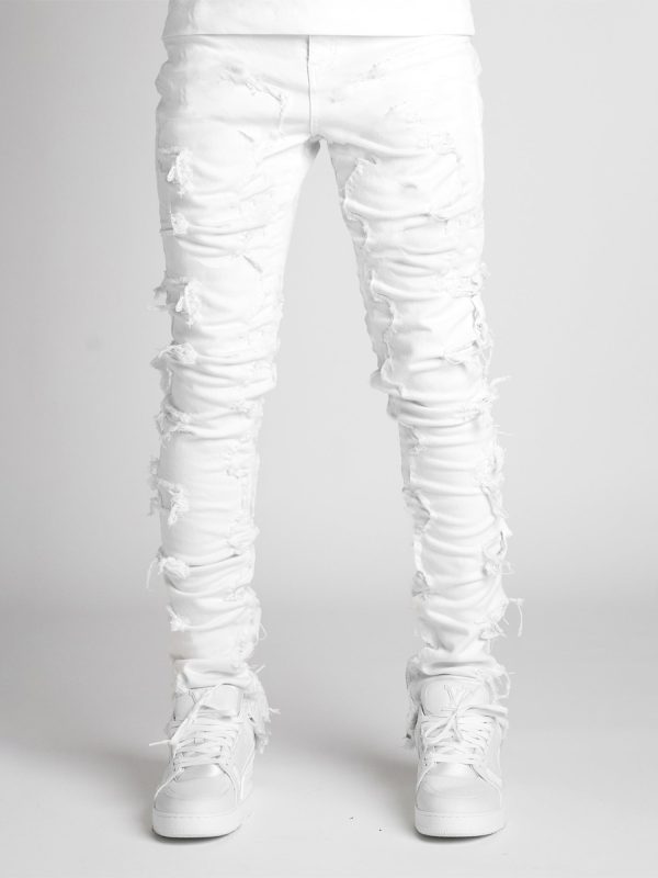 men's slim fit vintage patched distressed denim trousers for casual wear in spring and fall, featuring pockets.