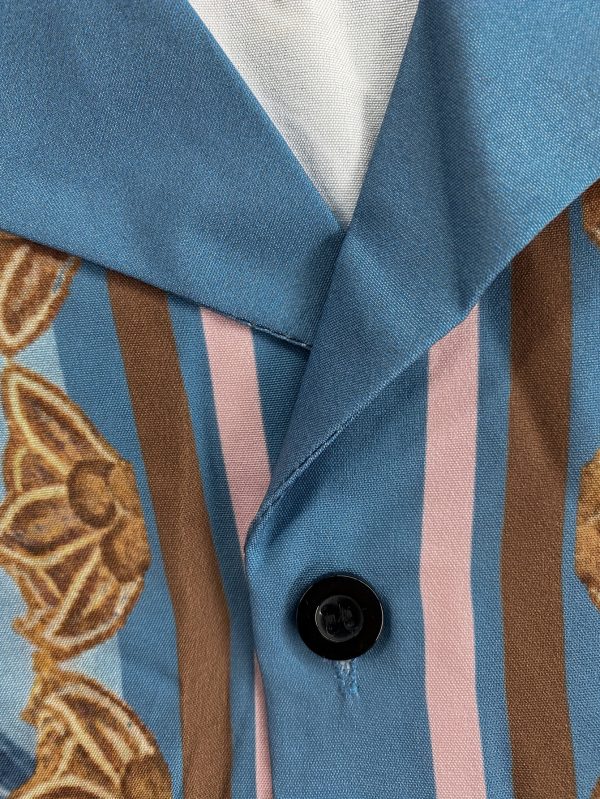 european and american men's fashion morandi color scheme with lake blue and orange contrast, ethnic print design casual shirt and shorts set