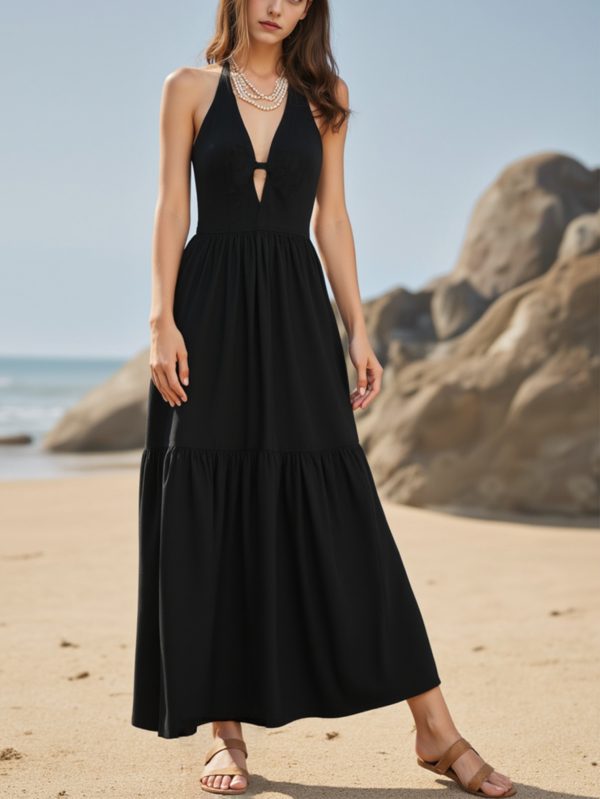 elegant black halter neck maxi dress with keyhole cutout sleeveless, flowing a line silhouette, perfect for summer beach or evening wear, beach dress