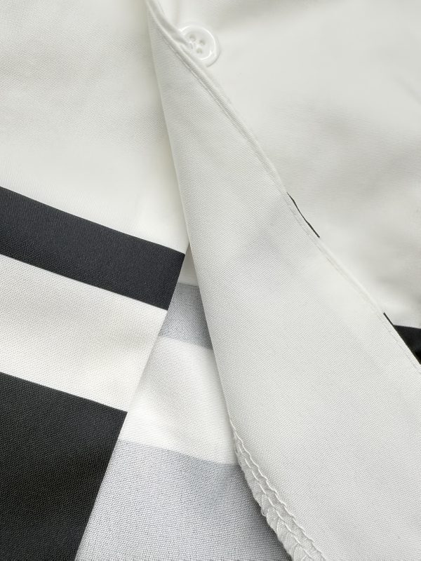 new products in 2025, a two piece set of simple men's short sleeved shirts and long pants for summer. it comes in a black and white color scheme, with a casual and stylish style, suitable for occasions such as daily outings and casual gatherings.