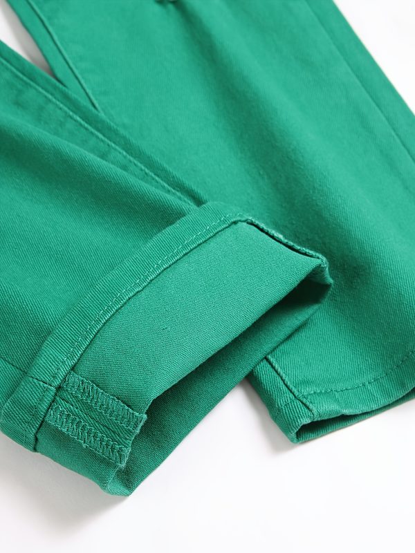 fashionable slim fit faux denim pants for men and women with ripped patches and elastic.