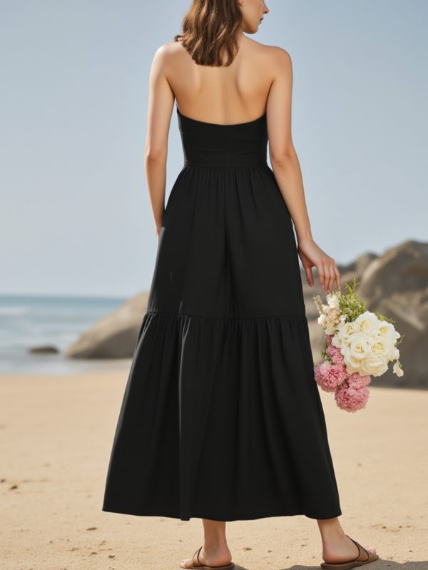 elegant black halter neck maxi dress with keyhole cutout sleeveless, flowing a line silhouette, perfect for summer beach or evening wear, beach dress